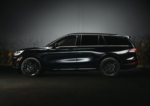 A 2024 Lincoln Aviator® SUV is shown in the Infinite Black exterior color | Joe Cooper Lincoln of Edmond in Oklahoma City OK
