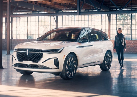A person approaches a 2024 Lincoln Nautilus® SUV. | Joe Cooper Lincoln of Edmond in Oklahoma City OK