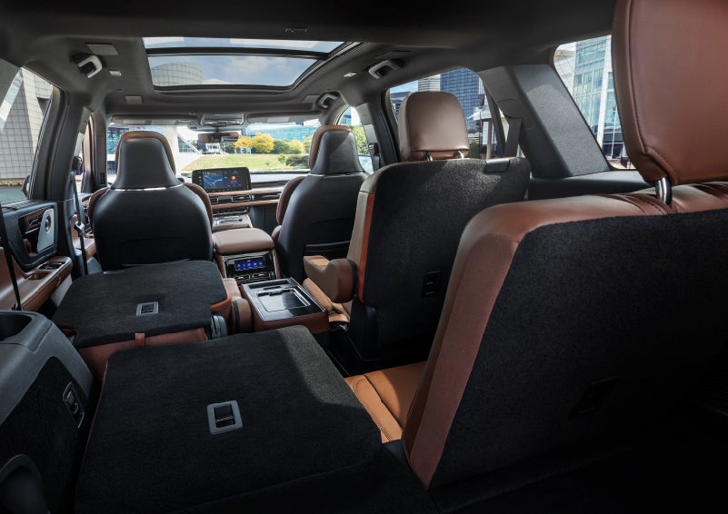 The interior of the 2025 Lincoln Aviator® SUV is shown with two seats folded down for added space. | Joe Cooper Lincoln of Edmond in Oklahoma City OK