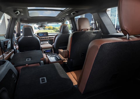The interior of the 2025 Lincoln Aviator® SUV is shown with two seats folded down for added space. | Joe Cooper Lincoln of Edmond in Oklahoma City OK