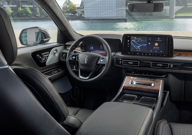 The interior of the 2025 Lincoln Aviator® SUV is shown parked with a view of a harbor through the windshield. | Joe Cooper Lincoln of Edmond in Oklahoma City OK