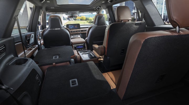 One side of the PowerFold® third-row seat and a second-row seat are folded forward in the 2026 Lincoln Aviator® SUV. | Joe Cooper Lincoln of Edmond in Oklahoma City OK