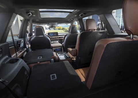 One side of the PowerFold® third-row seat and a second-row seat are folded forward in the 2026 Lincoln Aviator® SUV. | Joe Cooper Lincoln of Edmond in Oklahoma City OK