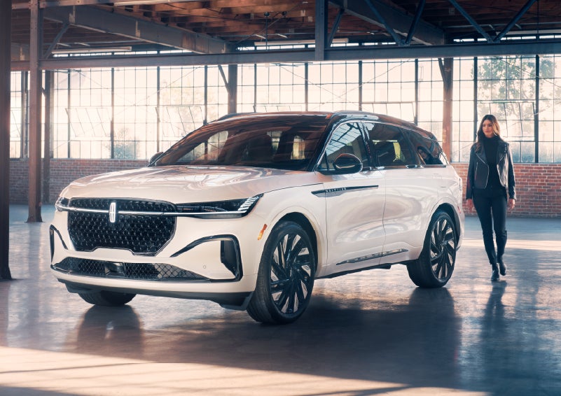 A person approaches a 2026 Lincoln Nautilus® SUV. | Joe Cooper Lincoln of Edmond in Oklahoma City OK